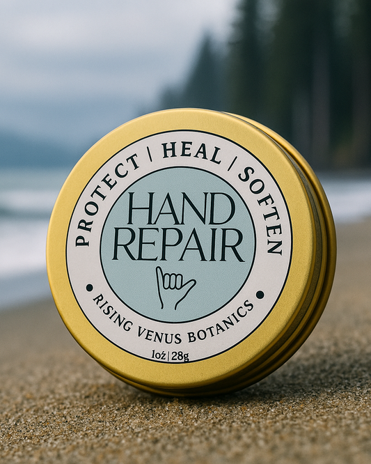 Hand repair balm container with 'Rising Venus Botanics' branding on a natural background